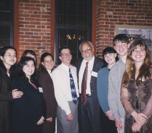 Dr. Robert Guthrie with Cummings Center staff and students